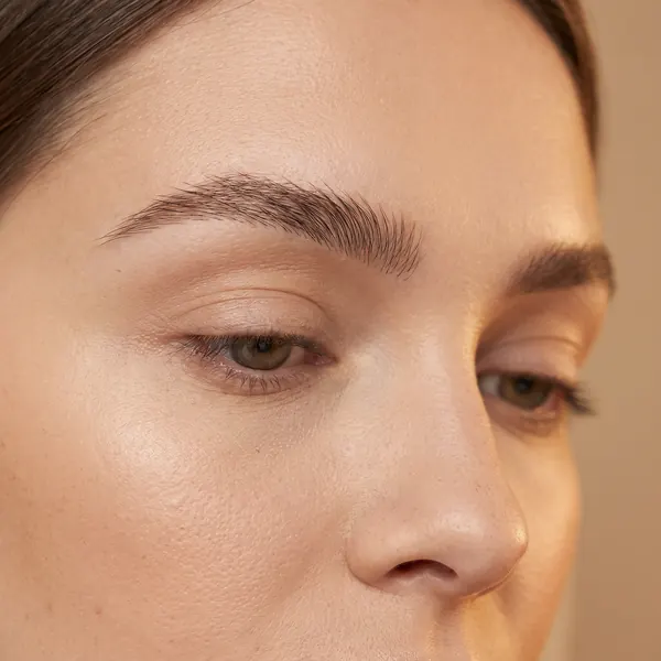 Full natural-looking eyebrows with hair-like brow extensions