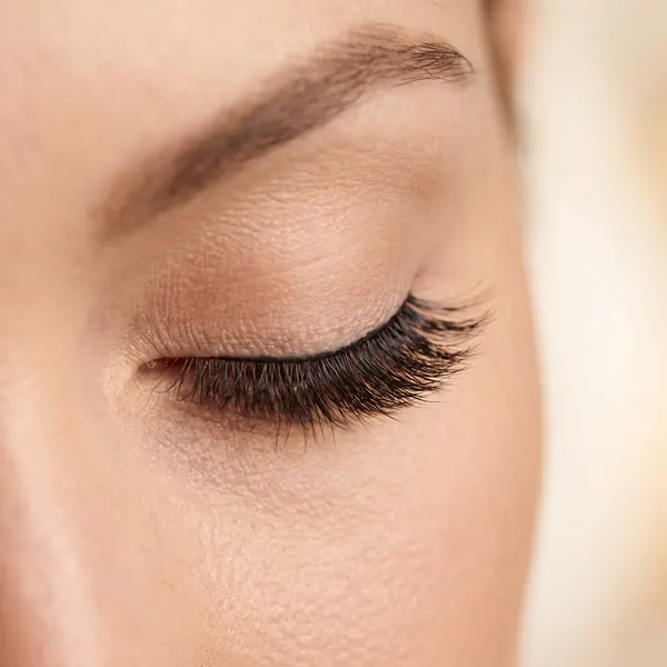 Closed eye with a soft, refined volume lash extension set